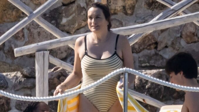 Law-Order-SVU-star-Mariska-Hargitay-61-reveals-her-curves-in-a-striped-swimsuit-on-Italian-getaway-with-family-2025-07-05T093021.211Z.jpg Law & Order SVU star Mariska Hargitay, 61, reveals her curves in a striped swimsuit on Italian getaway with family
