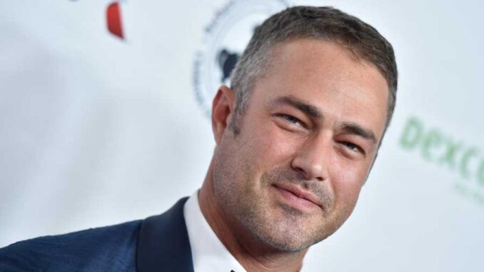 Jimmy Fallon Did a Polar Plunge with Taylor Kinney in His Full Suit