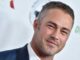 Jimmy Fallon Did a Polar Plunge with Taylor Kinney in His Full Suit
